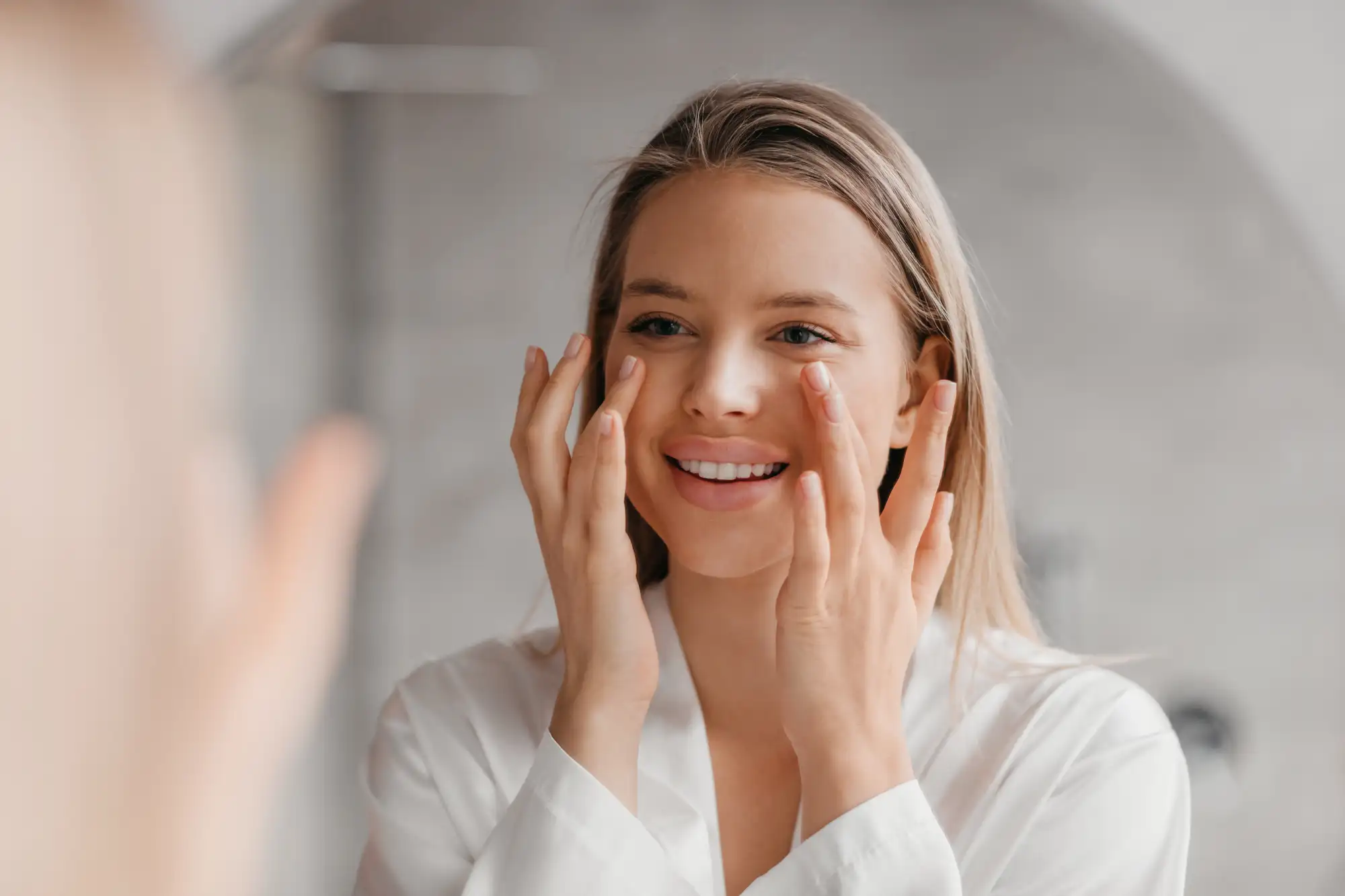 Beautiful woman softly touching her cheek in Lehi, UT | Avanti Medical Center