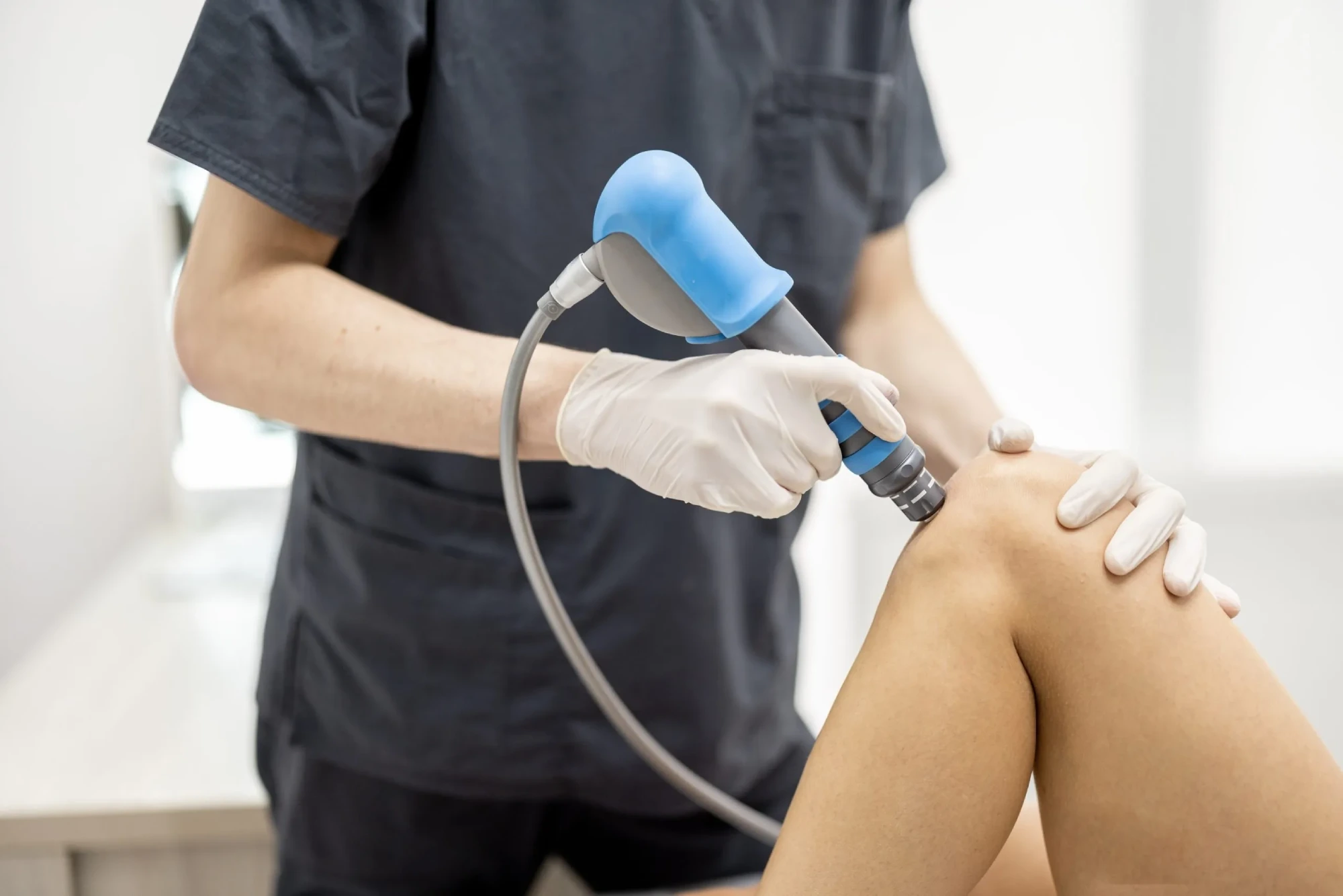 Client Receiving Acoustic Sound Wave Therapy in Lehi, UT | Avanti Medical Center